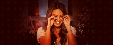mila-kunis-laughing-and-wiping-the-tears-away-reaction-gif
